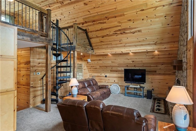 429 SE Lakeside Dr, Lacygne, KS 66040 - carpeted living area with wood walls, stairs, wood ceiling, and high vaulted ceiling