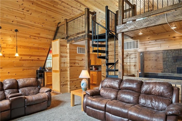 429 SE Lakeside Dr, Lacygne, KS 66040 - living room with wood walls, wood ceiling, high vaulted ceiling, carpet, and stairs