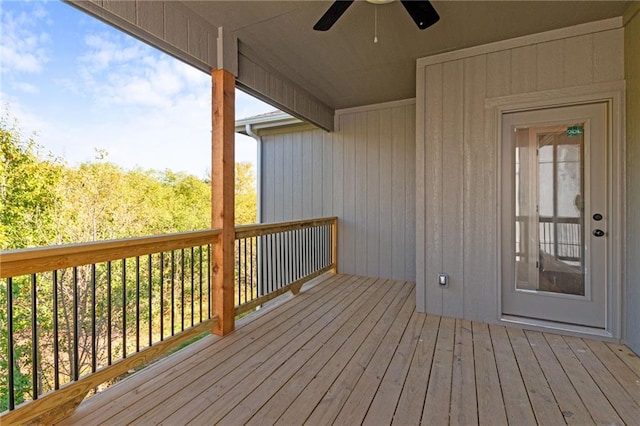 522 NW 110th St, Kansas City, MO 64155 - wooden deck with a ceiling fan