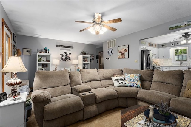 336 SE Zack Wheat Dr, Polo, MO 64671 - living area with ceiling fan