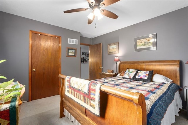 336 SE Zack Wheat Dr, Polo, MO 64671 - carpeted bedroom with a ceiling fan and a closet