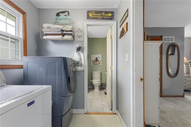 336 SE Zack Wheat Dr, Polo, MO 64671 - laundry room featuring independent washer and dryer and baseboards