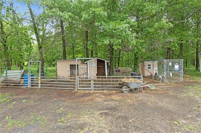 336 SE Zack Wheat Dr, Polo, MO 64671 - view of yard featuring an outdoor structure and an exterior structure