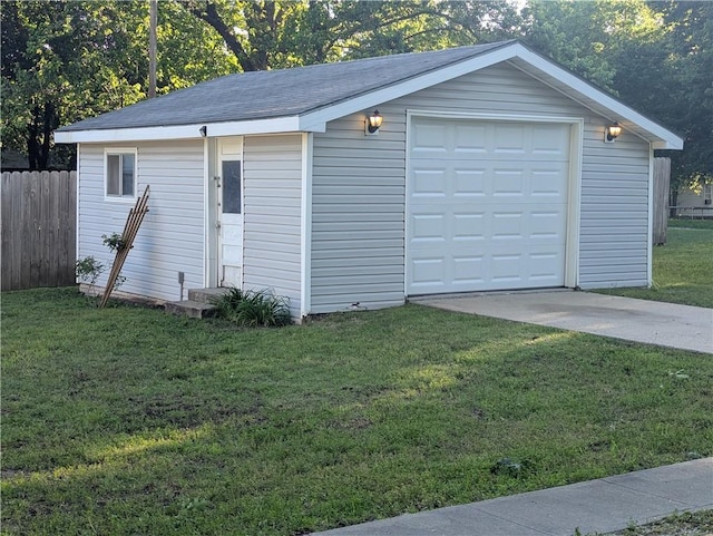 528 W Ashland St, Nevada, MO 64772 - detached garage featuring concrete driveway