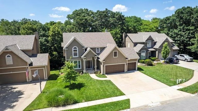 4612 Roberts St, Shawnee, KS 66226 - view of front facade with concrete driveway, a front lawn, a garage, and a chimney