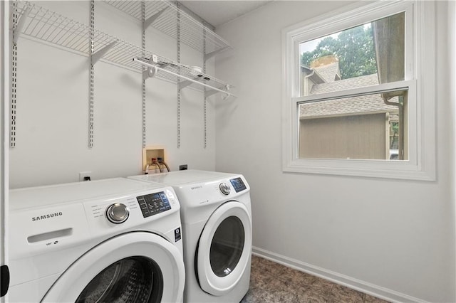 4612 Roberts St, Shawnee, KS 66226 - laundry room featuring washing machine and clothes dryer and baseboards