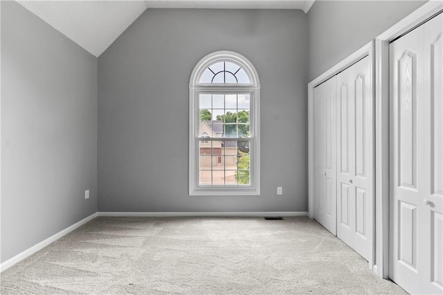 4612 Roberts St, Shawnee, KS 66226 - unfurnished bedroom featuring carpet flooring and vaulted ceiling