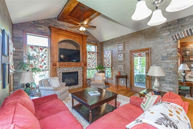 26650 W 100th Pl, Olathe, KS 66061 - living room featuring a large fireplace, wood finished floors, and a ceiling fan