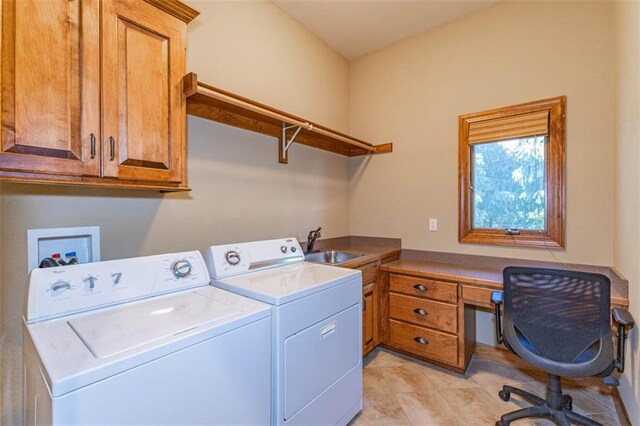 26650 W 100th Pl, Olathe, KS 66061 - laundry area featuring washing machine and clothes dryer, cabinet space, light tile patterned floors, and a desk