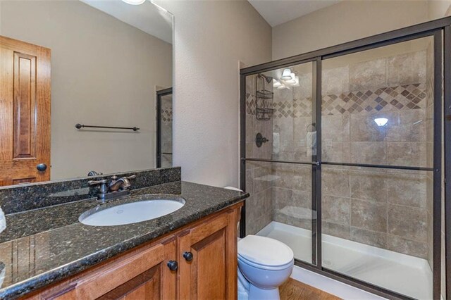 26650 W 100th Pl, Olathe, KS 66061 - bathroom with a shower stall, toilet, and vanity