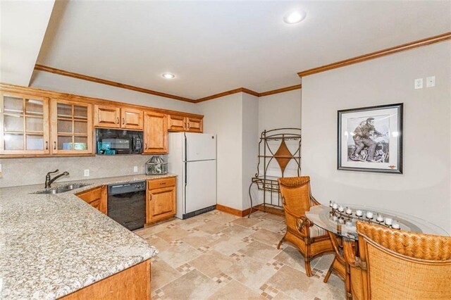26650 W 100th Pl, Olathe, KS 66061 - kitchen with black appliances, a sink, backsplash, glass insert cabinets, and brown cabinets