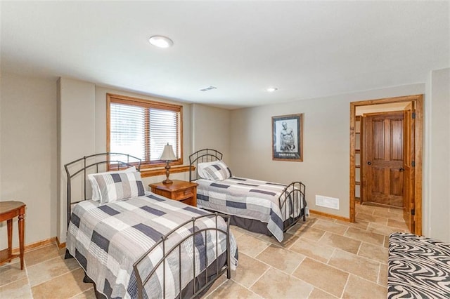 26650 W 100th Pl, Olathe, KS 66061 - bedroom featuring baseboards, recessed lighting, and light stone finish floors