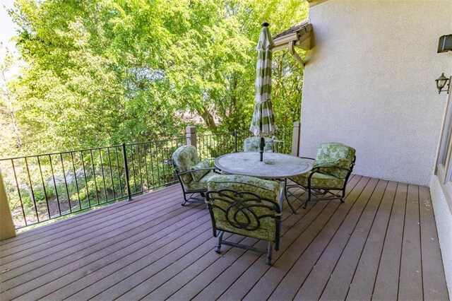 26650 W 100th Pl, Olathe, KS 66061 - wooden terrace featuring outdoor dining space
