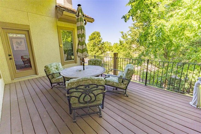 26650 W 100th Pl, Olathe, KS 66061 - wooden terrace with outdoor dining space
