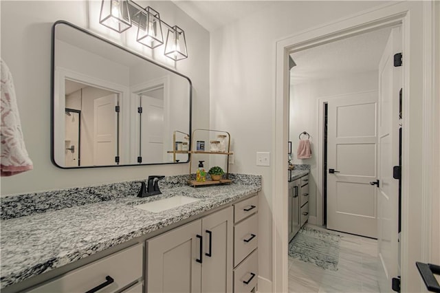2241 Foxtail Dr, Kearney, MO 64060 - bathroom with marble finish floors and vanity