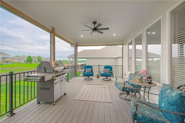 2241 Foxtail Dr, Kearney, MO 64060 - wooden terrace featuring area for grilling and a ceiling fan