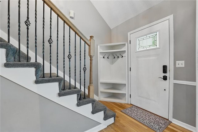 15642 W 146th Ter, Olathe, KS 66062 - mudroom with vaulted ceiling, wood finished floors, and baseboards
