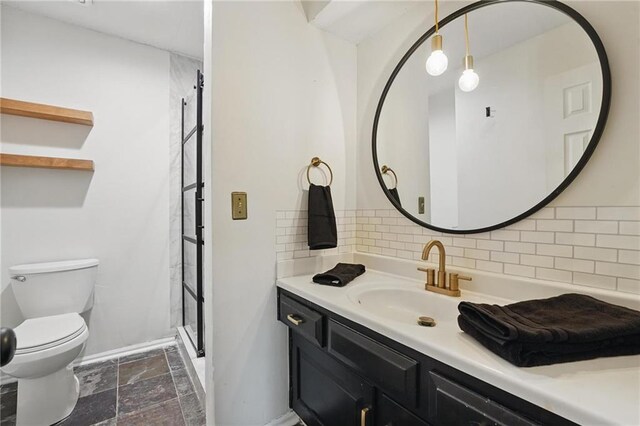 15642 W 146th Ter, Olathe, KS 66062 - full bath with decorative backsplash, toilet, a stall shower, vanity, and baseboards