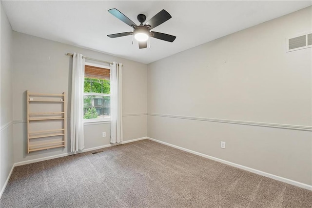 15642 W 146th Ter, Olathe, KS 66062 - carpeted spare room with baseboards and a ceiling fan