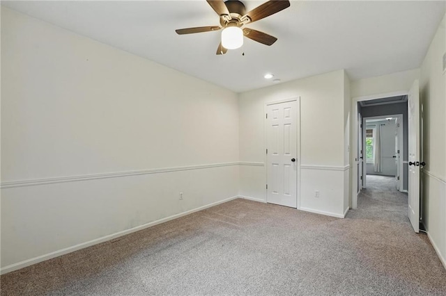 15642 W 146th Ter, Olathe, KS 66062 - unfurnished bedroom featuring light colored carpet, baseboards, ceiling fan, and recessed lighting