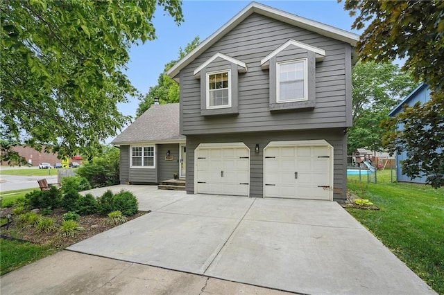 15642 W 146th Ter, Olathe, KS 66062 - view of front facade featuring a garage, concrete driveway, and a front lawn