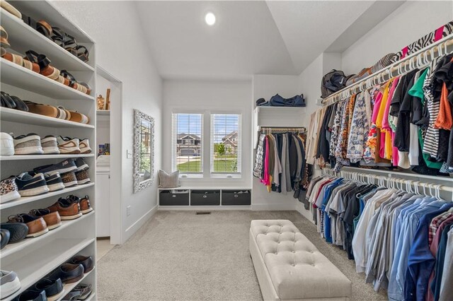 11573 S Mize Rd, Olathe, KS 66061 - walk in closet with vaulted ceiling and carpet