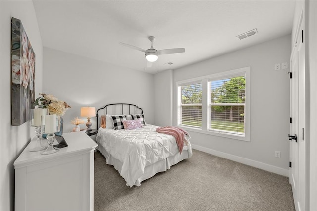 11573 S Mize Rd, Olathe, KS 66061 - bedroom with baseboards, light colored carpet, and a ceiling fan