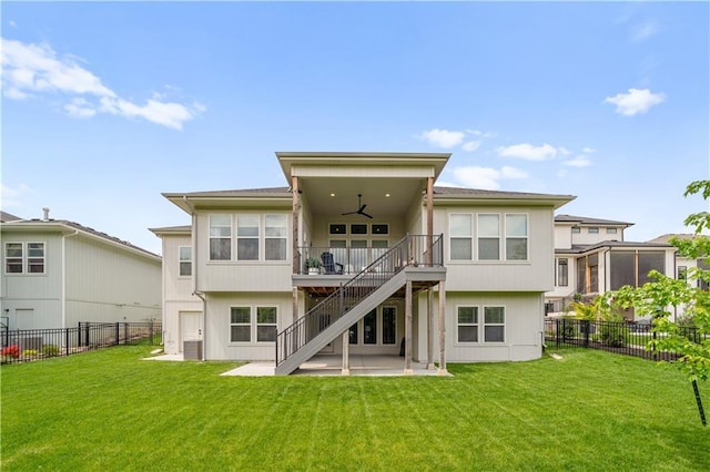 11573 S Mize Rd, Olathe, KS 66061 - rear view of house with ceiling fan, stairway, and a patio