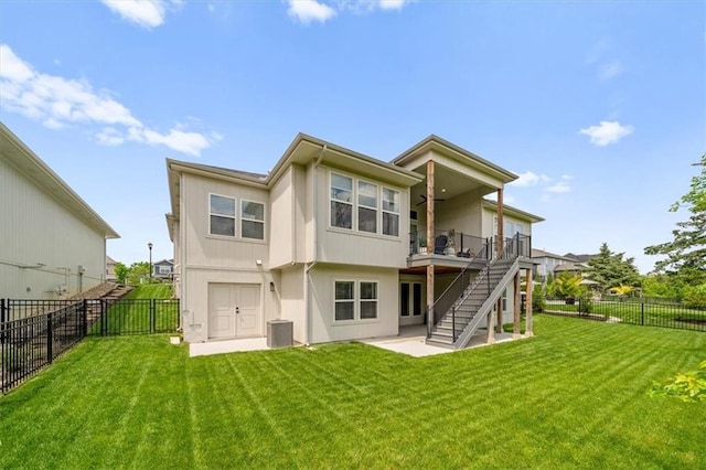 11573 S Mize Rd, Olathe, KS 66061 - back of house with stairway, a patio, and a wooden deck