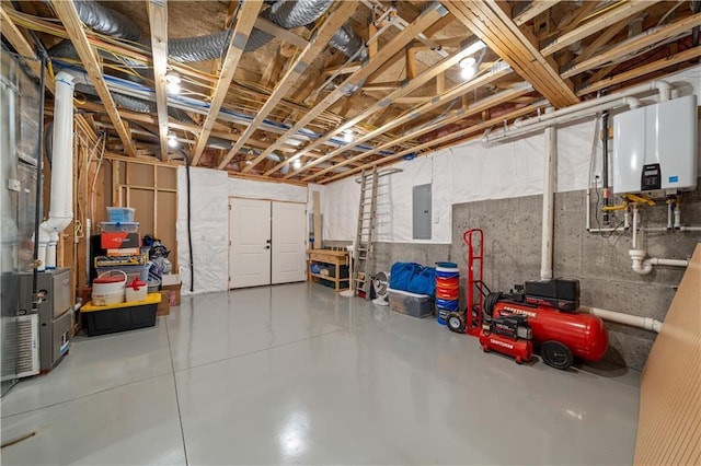 11573 S Mize Rd, Olathe, KS 66061 - garage featuring tankless water heater and electric panel