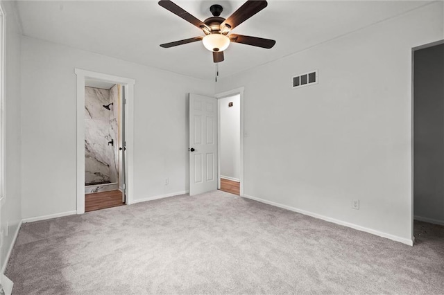 8003 E 118th Ter, Kansas City, MO 64134 - unfurnished bedroom with carpet floors, baseboards, and ceiling fan