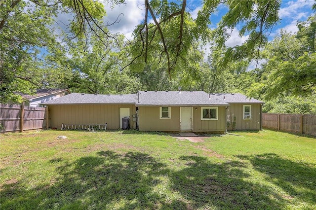 5316 NE 49th St, Kansas City, MO 64119 - back of house with a fenced backyard