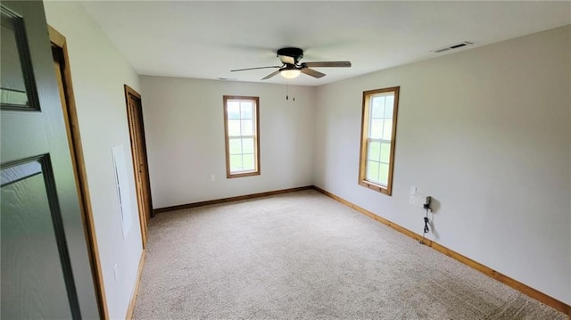 13106 Quinn Rd, Pleasanton, KS 66075 - carpeted empty room with a ceiling fan and baseboards
