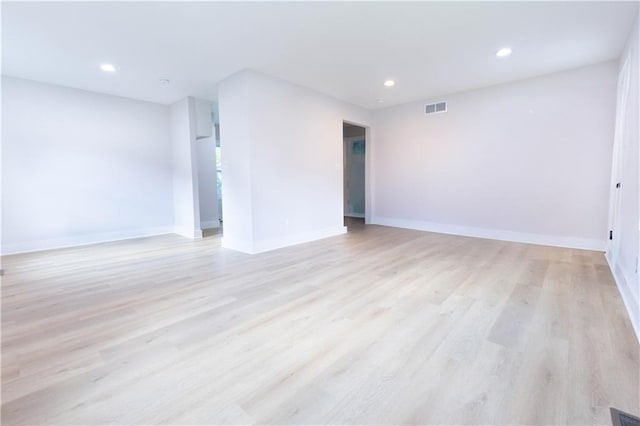 3312 Delavan Ave, Kansas City, KS 66104 - empty room featuring recessed lighting, light wood-style flooring, and baseboards
