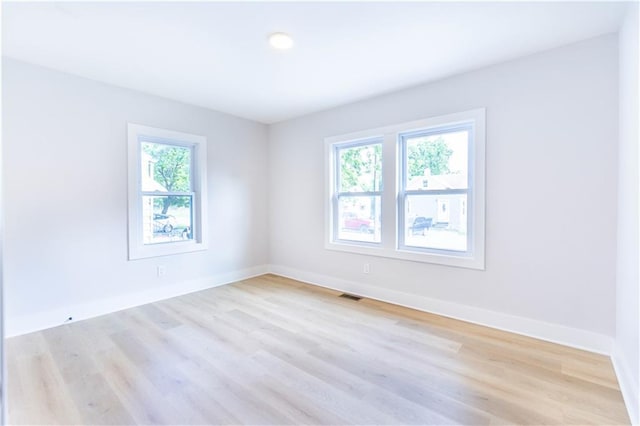 3312 Delavan Ave, Kansas City, KS 66104 - spare room featuring light wood finished floors and baseboards