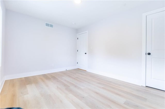 3312 Delavan Ave, Kansas City, KS 66104 - unfurnished room with wood finished floors and baseboards
