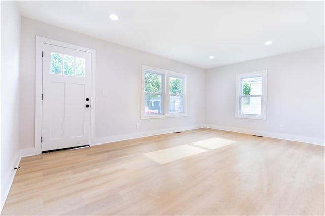 3312 Delavan Ave, Kansas City, KS 66104 - foyer entrance with plenty of natural light, light wood-style flooring, baseboards, and recessed lighting