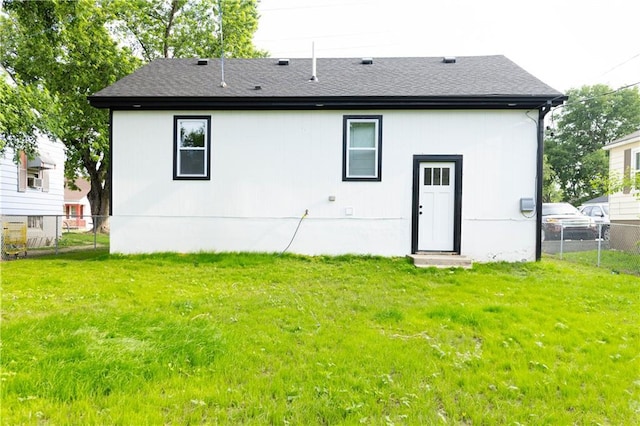 3312 Delavan Ave, Kansas City, KS 66104 - back of property featuring roof with shingles