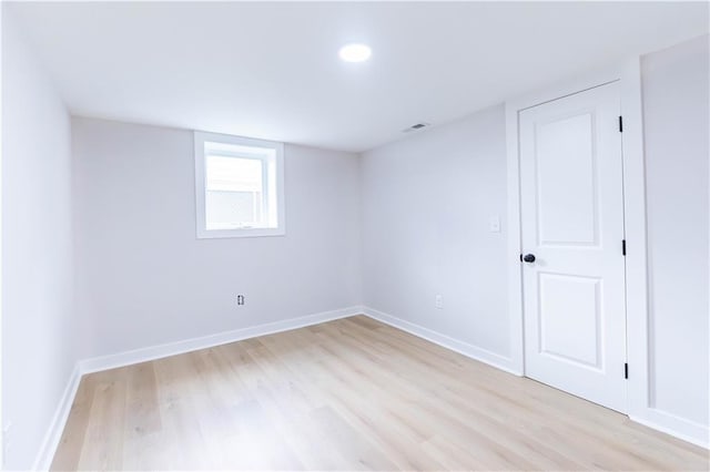 3312 Delavan Ave, Kansas City, KS 66104 - below grade area featuring light wood-type flooring and baseboards