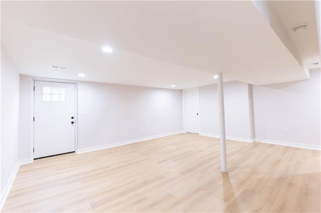3312 Delavan Ave, Kansas City, KS 66104 - below grade area featuring light wood-type flooring, recessed lighting, and baseboards