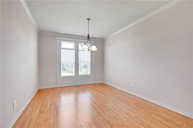4641 SW Soldier Dr, Lees Summit, MO 64082 - empty room featuring a chandelier, light wood-style flooring, a textured ceiling, baseboards, and crown molding