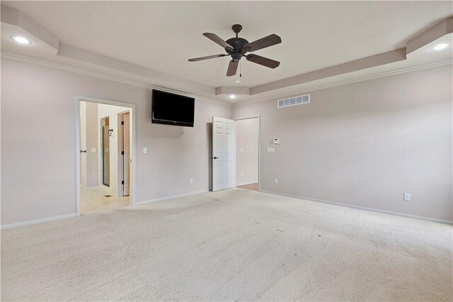 4641 SW Soldier Dr, Lees Summit, MO 64082 - spare room featuring recessed lighting, ceiling fan, a raised ceiling, light carpet, and baseboards