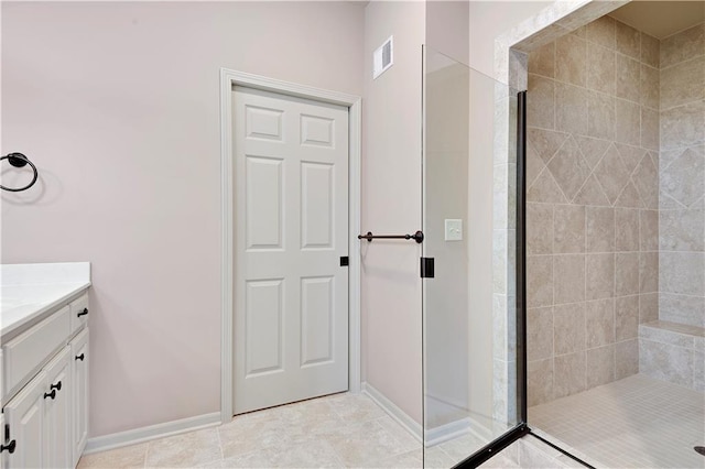 4641 SW Soldier Dr, Lees Summit, MO 64082 - bathroom with a tile shower, baseboards, and vanity