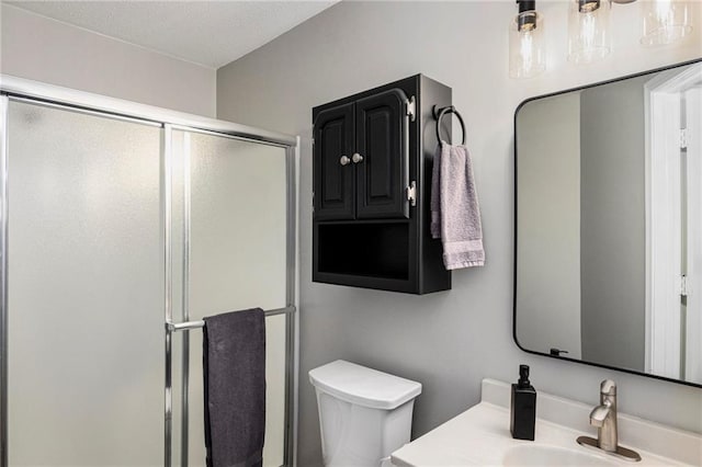 5208 NW 58th Ter, Kansas City, MO 64151 - full bathroom with a stall shower, toilet, and vanity