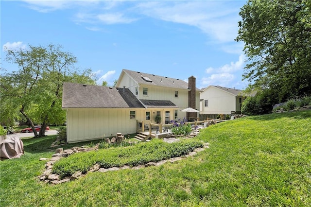 5208 NW 58th Ter, Kansas City, MO 64151 - back of property featuring a yard, a deck, and a chimney