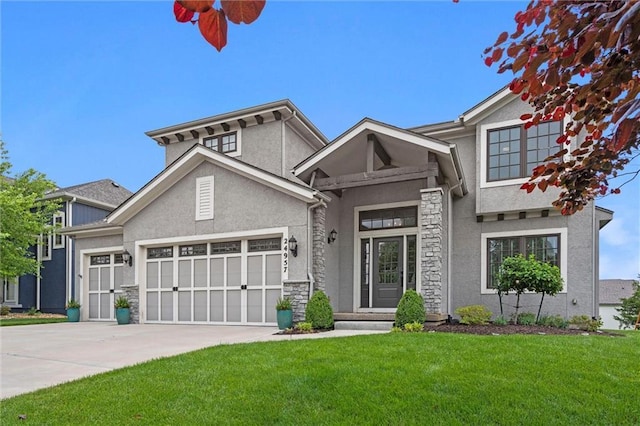 24957 W 98th St, Lenexa, KS 66227 - view of front facade featuring stone siding, an attached garage, and stucco siding