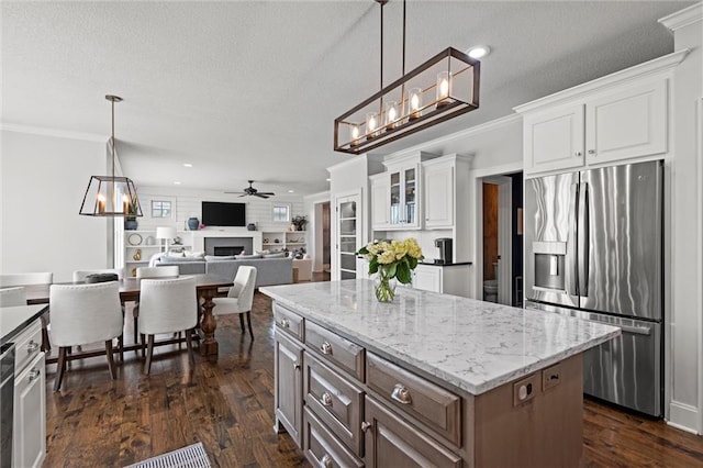 24957 W 98th St, Lenexa, KS 66227 - kitchen with stainless steel fridge with ice dispenser, crown molding, white cabinetry, dark wood-style floors, and a ceiling fan