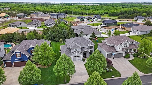 24957 W 98th St, Lenexa, KS 66227 - aerial view of residential area with a forest