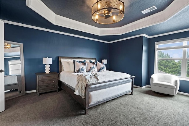 24957 W 98th St, Lenexa, KS 66227 - carpeted bedroom with a chandelier, a raised ceiling, baseboards, ornamental molding, and a textured ceiling