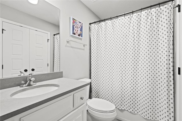 24957 W 98th St, Lenexa, KS 66227 - full bath featuring toilet, vanity, and a shower with shower curtain